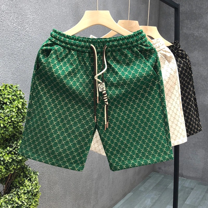 Short vert Celine à imprimé all-over : pourquoi l'annonce indique aussi une couleur unie